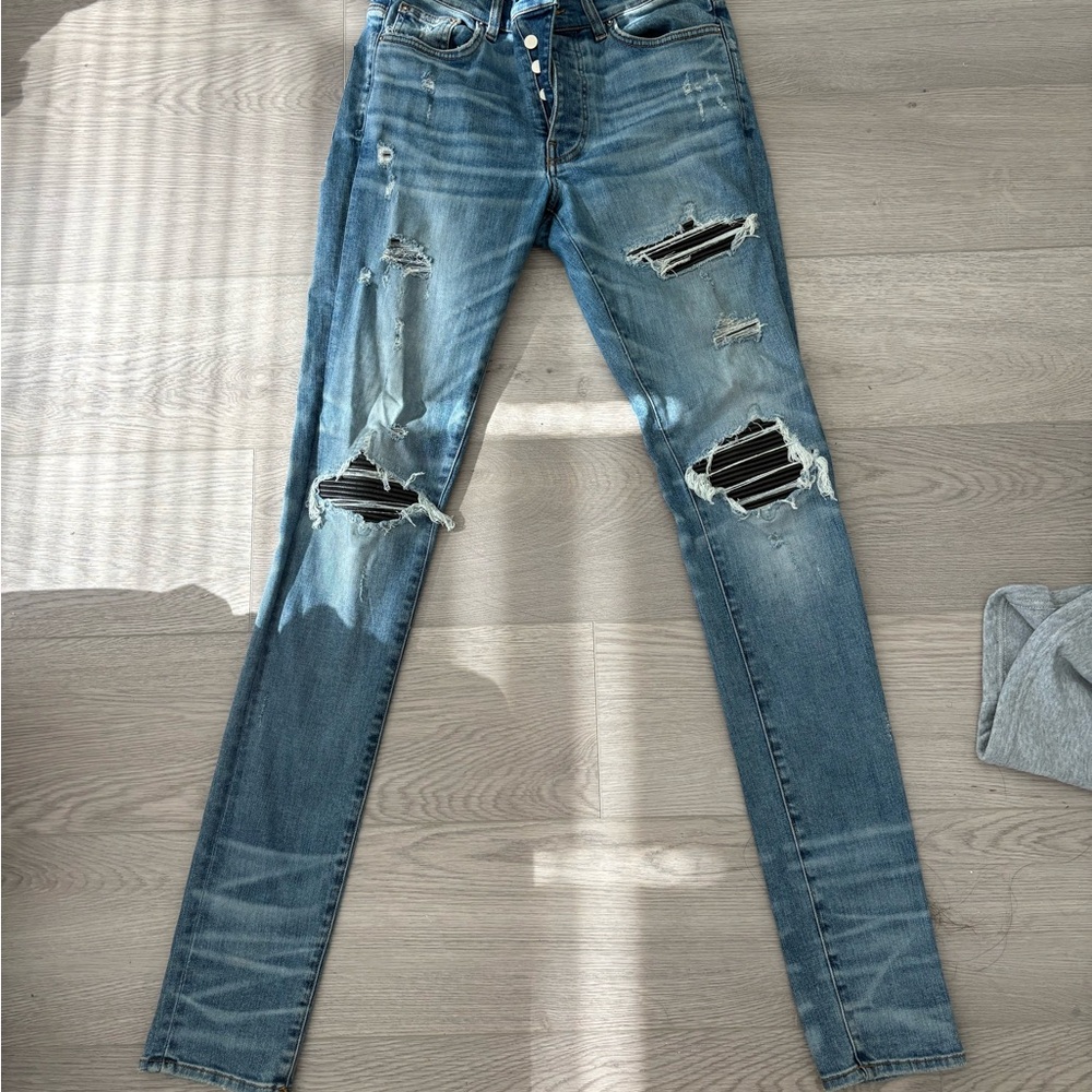 AMIRI Distressed Light Blue Skinny Jeans